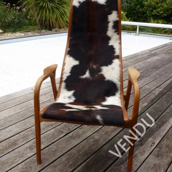 Made in Suede pour le fauteuil Lamino édité par Swedese structure en chêne et recouvert de peau